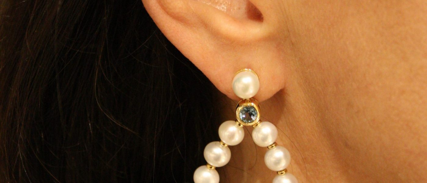 Pendientes perlas topacio puestos